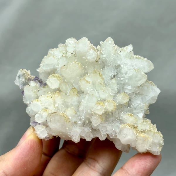 Yellow-skinned quartz cluster with purple fluorite from Fujian, China, second angle