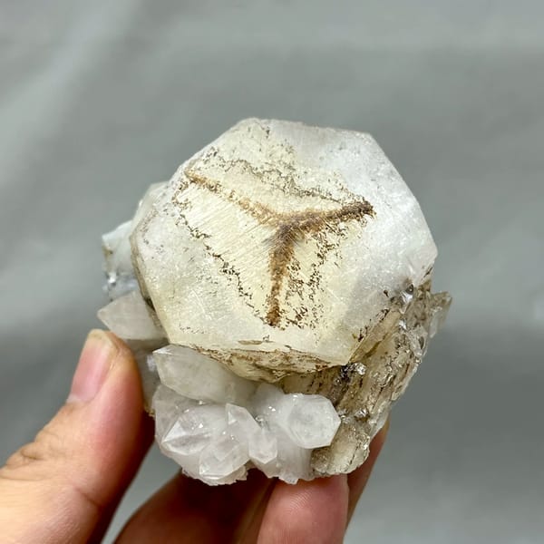 Large hexagonal calcite crystal with star-shaped growth pattern from Fujian, China, reverse side