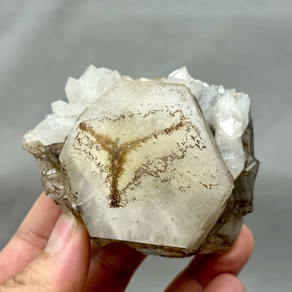 Large hexagonal calcite crystal with star-shaped growth pattern from Fujian, China, top view
