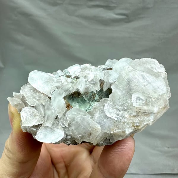 White calcite blades over glassy green fluorite from Xianghualing, Hunan, China, reverse side