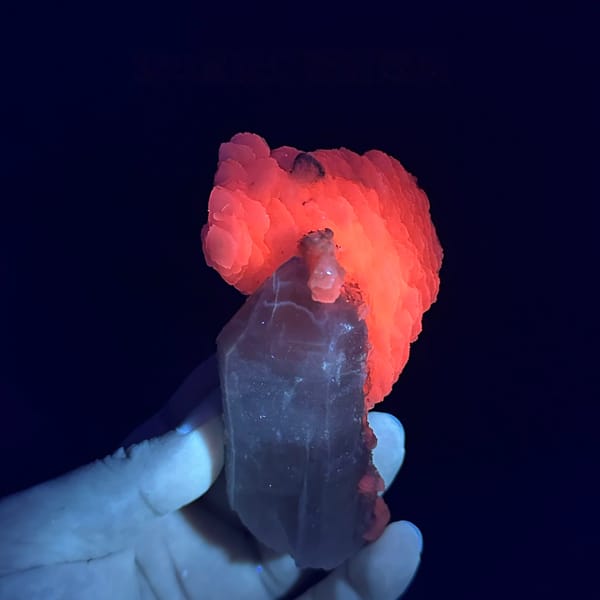 Pale quartz prism topped with layered white calcite from Inner Mongolia, China, second angle