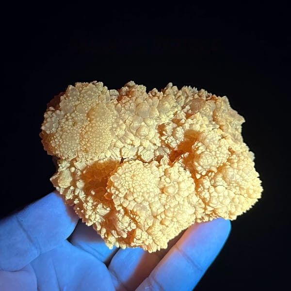 Golden-yellow botryoidal calcite balls from Guizhou, China, second angle