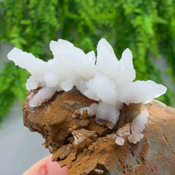 White calcite sprays on brown siderite block from Guizhou, China, second angle