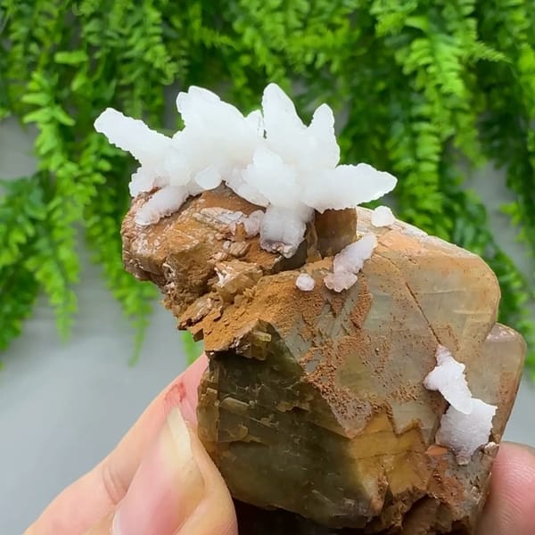 White calcite sprays on brown siderite block from Guizhou, China, top view