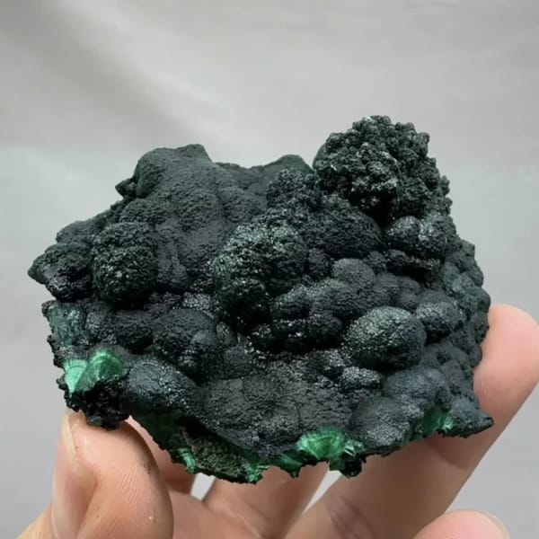 Dark green botryoidal malachite crust from DR Congo, reverse side