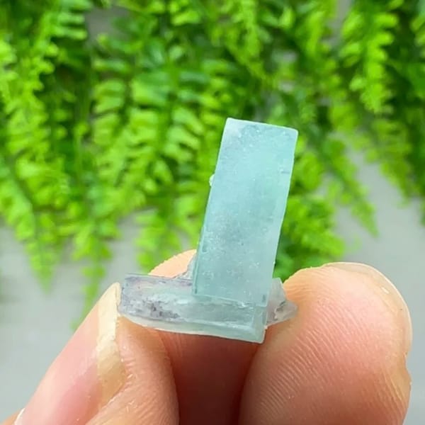 Tiny L-shaped blue-and-white fluorite crystal from Inner Mongolia, China, reverse side