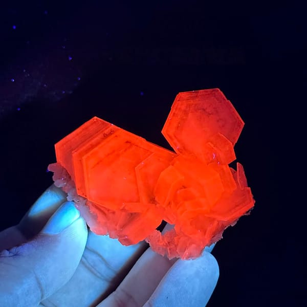 Stacked hexagonal calcite plates with orange growth lines from Fujian, China, second angle