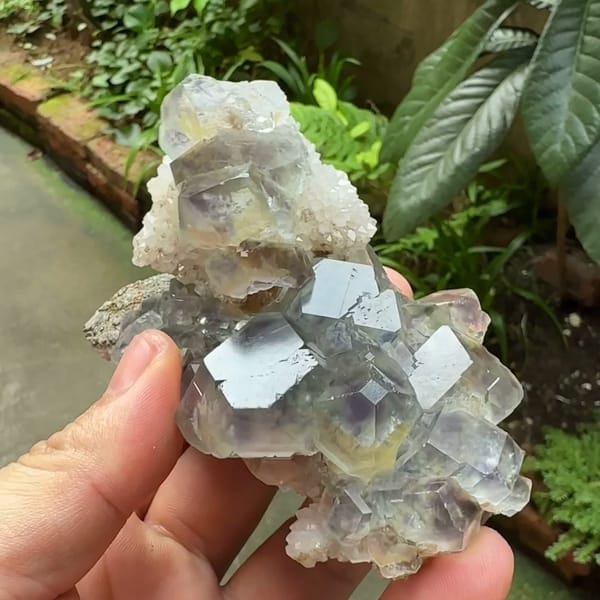 Glassy blue-green fluorite dodecahedra along quartz ridge from Fujian, China, second angle