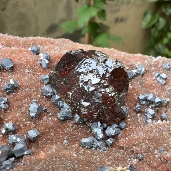 Large gem sphalerite crystal with galena on red-brown quartz from Hunan, China, reverse side