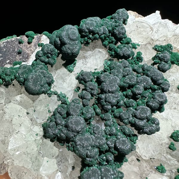 Green malachite islands on white quartz plate from Laos, second angle
