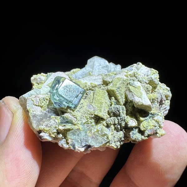 Green fluorite octahedron on yellow-green mica and feldspar from Yunxiao, Fujian, China, second angle