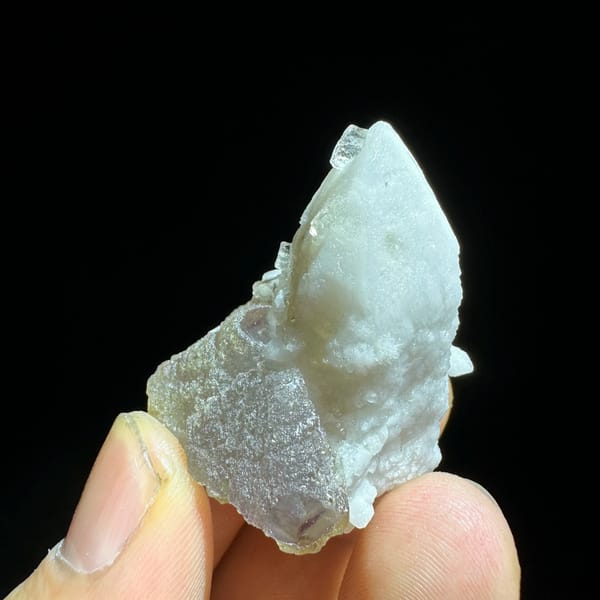 Pale blue-green fluorite enclosing candle quartz from Inner Mongolia, China, reverse side
