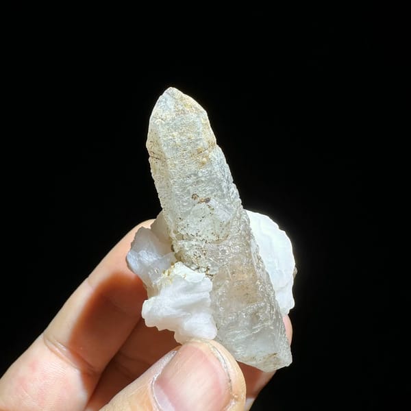 Slender frosted quartz prism with white calcite blade from Inner Mongolia, China, reverse side