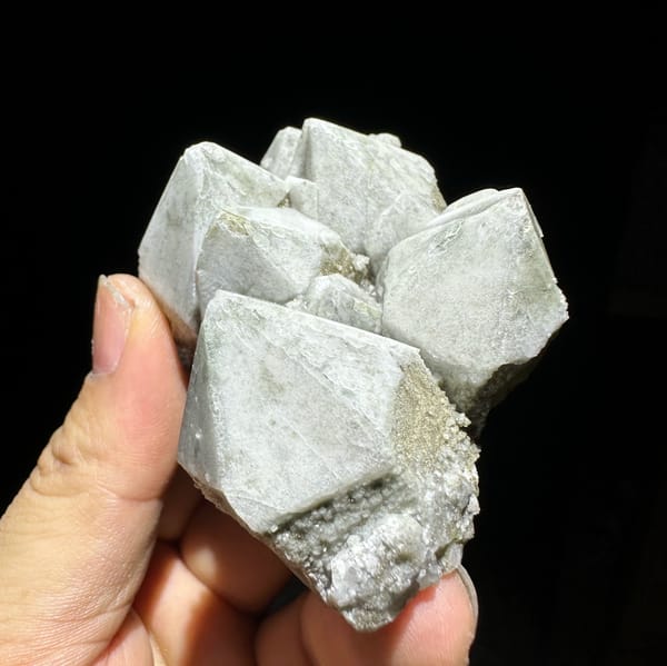 Large blocky white quartz crystals with bright skin from Inner Mongolia, China, close-up of the crystal faces