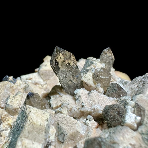 Smoky scepter quartz among cream feldspar from Yunxiao, Fujian, China, second angle