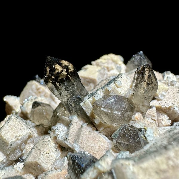 Smoky scepter quartz among cream feldspar from Yunxiao, Fujian, China, reverse side