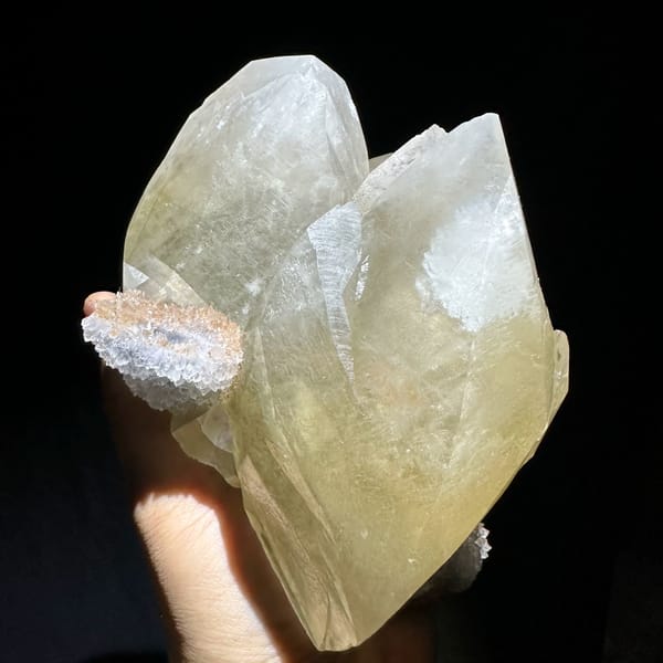 Huge golden calcite crystal on white quartz druse from Fujian, China, top view