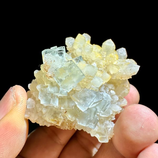 Ice-clear fluorite cubes on golden quartz cluster from Guizhou, China, second angle