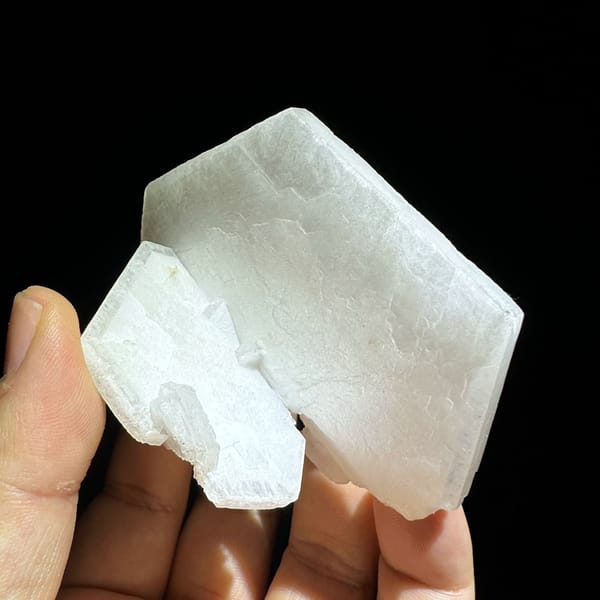 Large flat milky-white tabular calcite crystal from Fujian, China, close-up of the crystal faces