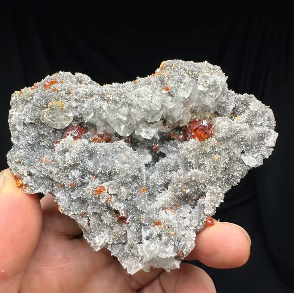 Red gem sphalerite crystals on grey calcite and quartz from Hunan, China, reverse side