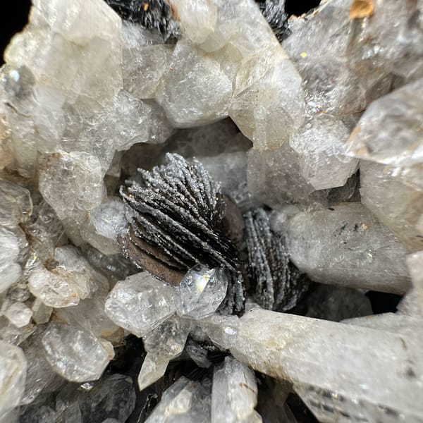 Tower of sugar-textured white quartz with black specular hematite from Guangdong, China, second angle