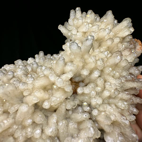 Plate of pale prismatic calcite crystals from Guizhou, China, top view