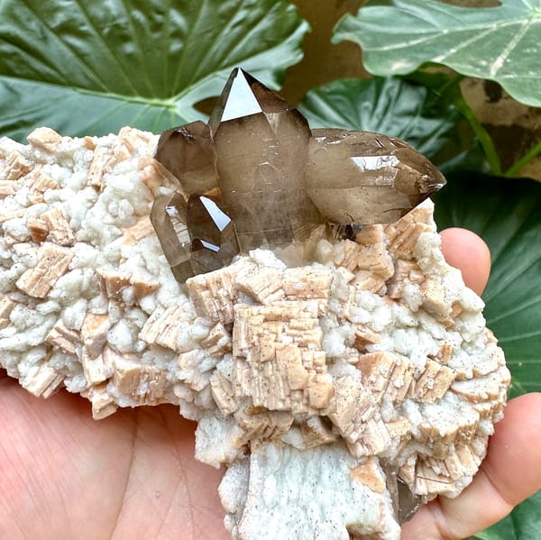 High-lustre smoky quartz on feldspar plate from Yunxiao, Fujian, China, second angle