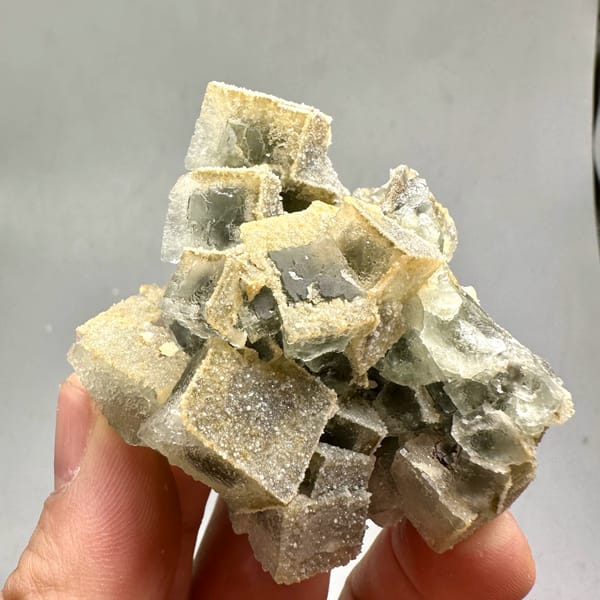 Etched cream fluorite cubes with sugary skin from Fujian, China, second angle