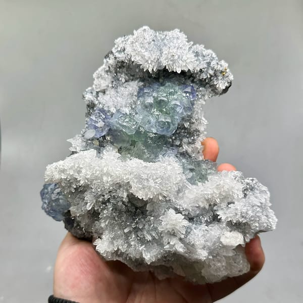Large quartz druse plate with blue-green fluorite and calcite from Fujian, China, reverse side