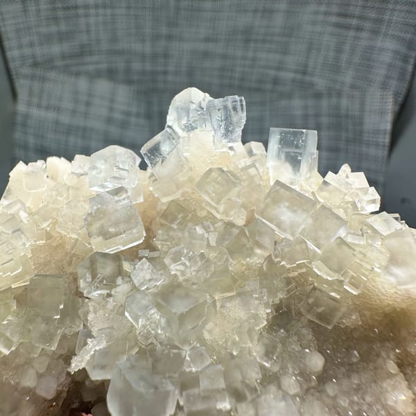 Colourless fluorite cubes on quartz plate from Guizhou, China, second angle