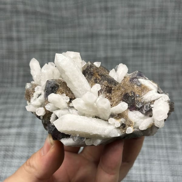 White candle quartz prisms with purple fluorite octahedron from Inner Mongolia, China