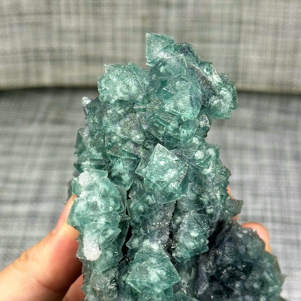 Teal-green octahedral fluorite with snowflake inclusions from Fujian, China, reverse side