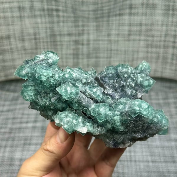 Teal-green octahedral fluorite with snowflake inclusions from Fujian, China, top view