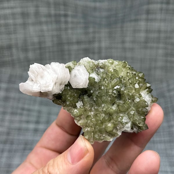Green chlorite-coated quartz with white hexagonal calcite from Fujian, China, top view