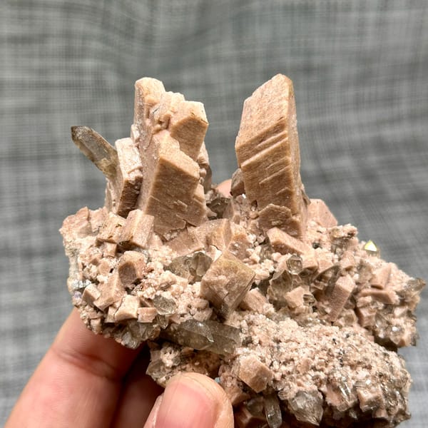 Salmon-pink prismatic feldspar crystals with smoky quartz from Yunxiao, Fujian, China, second angle