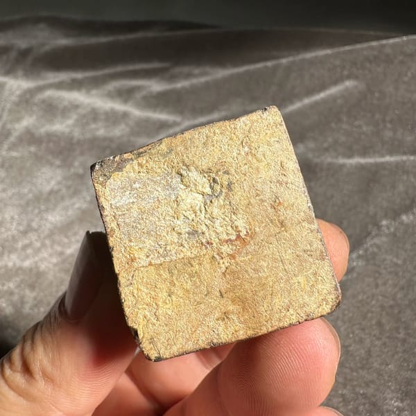 Large golden-brown limonite cube pseudomorph after pyrite from Guangxi, China, reverse side