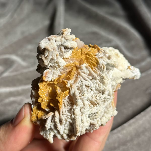 Orange-yellow mimetite on white aragonite and baryte from Morocco, reverse side