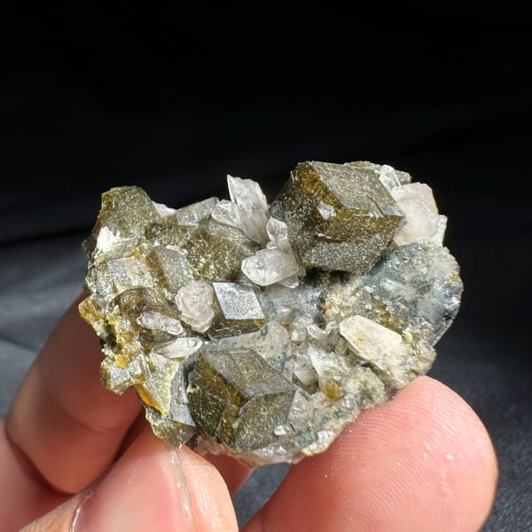 Interpenetrant-twinned garnet crystals with quartz from Inner Mongolia, China, second angle