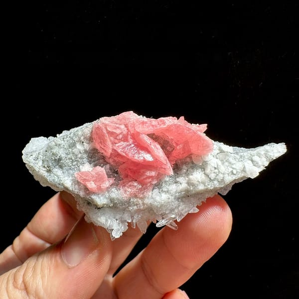 Rose-pink rhodochrosite cluster on white quartz needles from Wuzhou, Guangxi, China