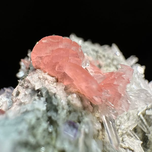 Pink rhodochrosite and purple fluorite with quartz needles from Wuzhou, Guangxi, China, second angle