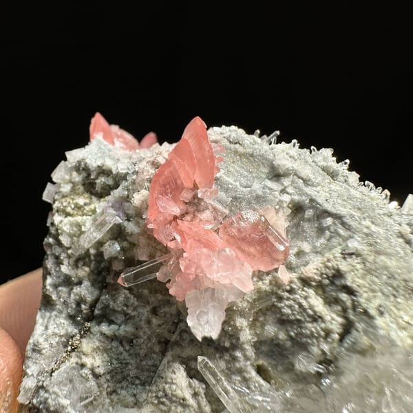 Pink rhodochrosite and purple fluorite with quartz needles from Wuzhou, Guangxi, China, reverse side