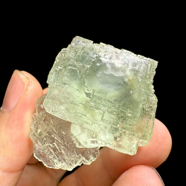 Glass-clear pale green fluorite cube from Guangdong, China, reverse side