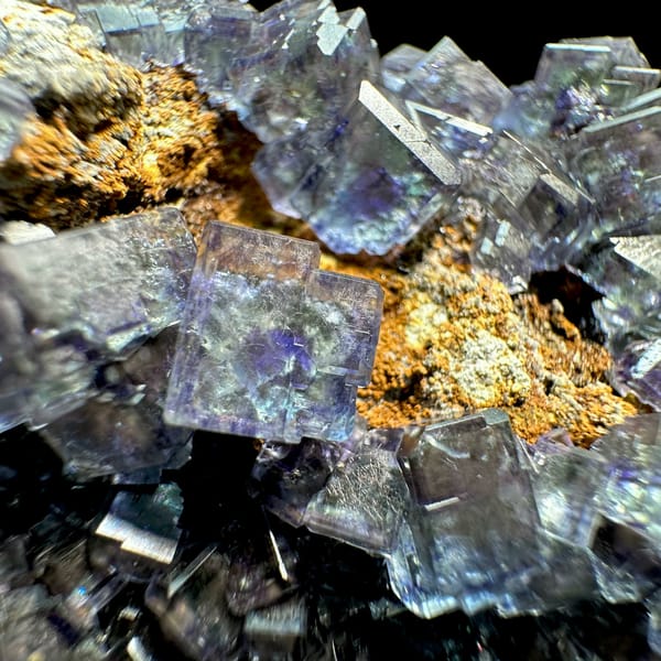 Glassy blue-green phantom fluorite cubes with pyrite dust from Fujian, China, second angle