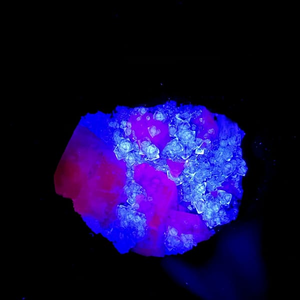 Pale blue-cored fluorite octahedra with white calcite from Fujian, China, second angle