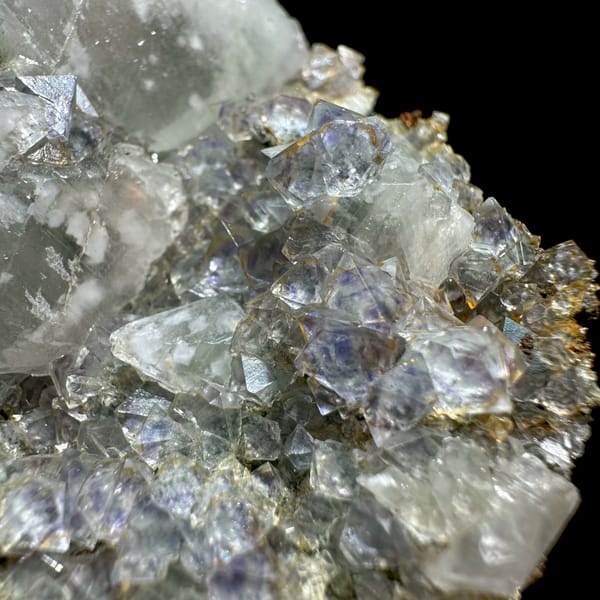 Pale blue-cored fluorite octahedra with white calcite from Fujian, China, reverse side