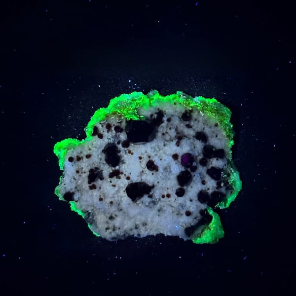 Large dark-red garnets with hyalite opal on white feldspar from Yunxiao, Fujian, China, second angle
