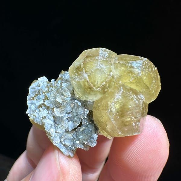 Glassy yellow calcite crystals with dolomite and siderite from Guizhou, China, top view
