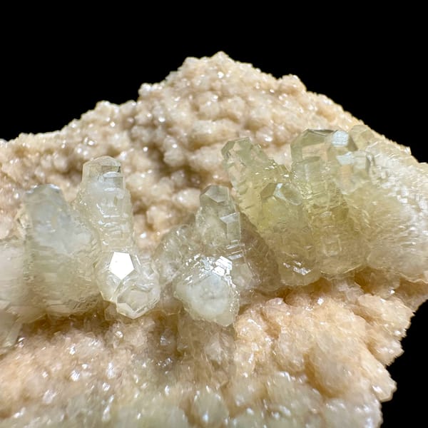 Pale cream feather-calcite plate from Hubei, China, close-up of the crystal faces