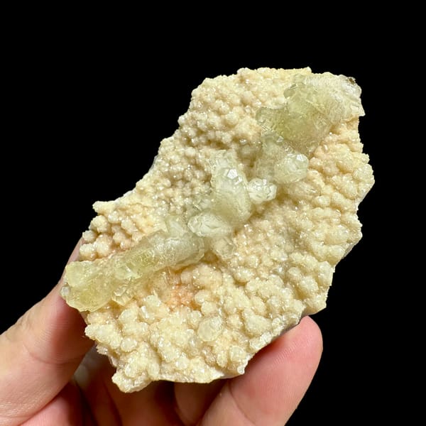 Pale cream feather-calcite plate from Hubei, China, reverse side