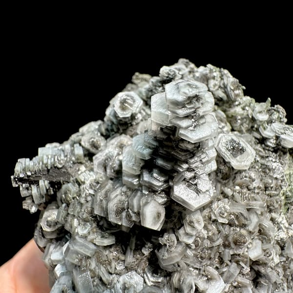 Hexagonal tower calcite crystals on grey quartz from Fujian, China, reverse side